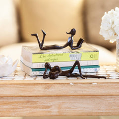 Man and Woman Leisurely Reading a Book Bronze Sculptures
