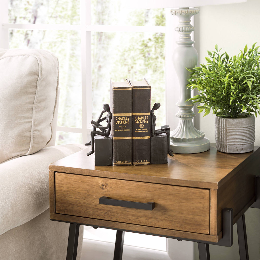 Man and Woman Reading on a Block Cast Iron Bookend Set