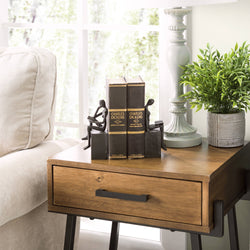 Man and Woman Reading on a Block Cast Iron Bookend Set