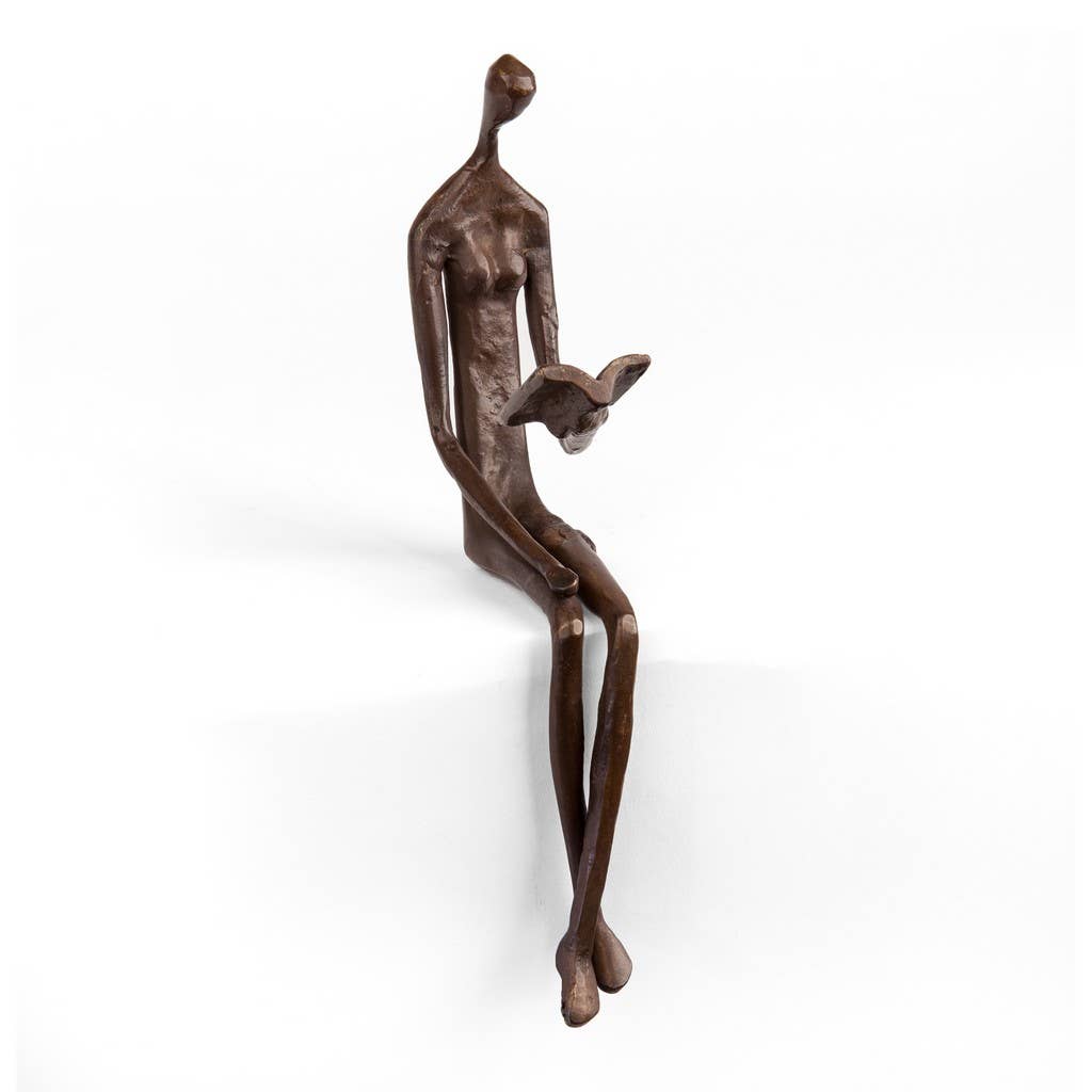 Woman Reading Over Ledge Cast Bronze