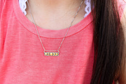 Celestial Bar Necklace with Sun, Moon, and Stars